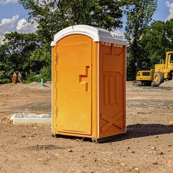 how often are the portable restrooms cleaned and serviced during a rental period in Baldwin County